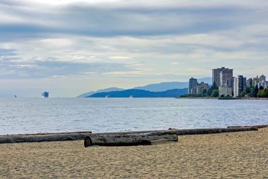 West Vancouver side overview with cruise liner and cargo ships in Burrard inlet.