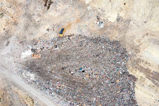 Aerial top view of a city garbage dump. Waste Disposal Facility