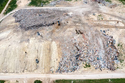 Aerial top view of a city garbage dump. Waste Disposal Facility