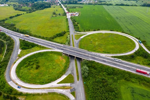 Aerial view from a drone of a road junction. Transportation and infrastructure concept