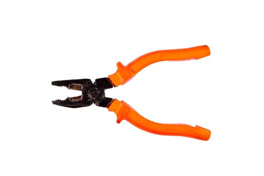 Used pliers with orange rubber handles, isolated on white background