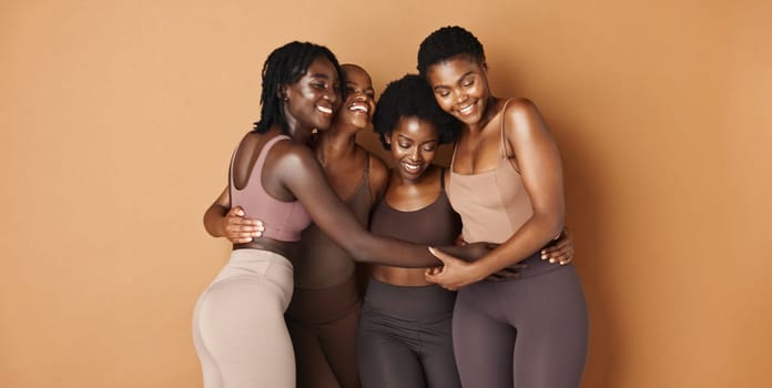 Hug, face or African models with skincare, glowing skin or results isolated on brown background. Facial dermatology, friends or natural beauty cosmetics in studio with black women or happy people.