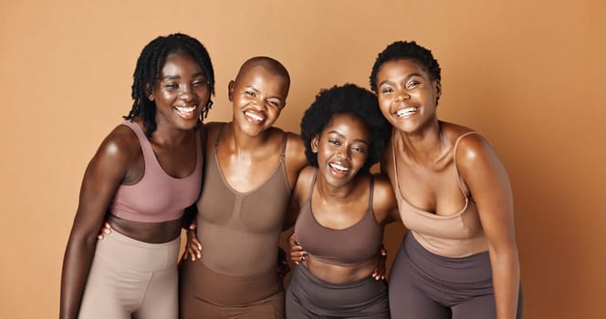 Laughing, face or African models with skincare, glowing skin or results isolated on brown background. Facial dermatology, friends hug or natural beauty in studio with black women or happy people.