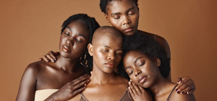 Skincare, beauty and face of black women in studio with glowing, natural and facial routine. Health, cosmetic and portrait of African female friends with dermatology treatment by brown background