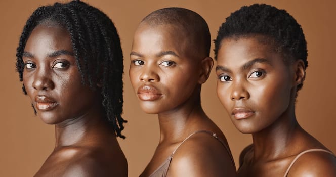 Skincare, beauty and young black women in studio with glowing, natural and facial routine. Wellness, cosmetic and portrait of African female friends with dermatology treatment by brown background