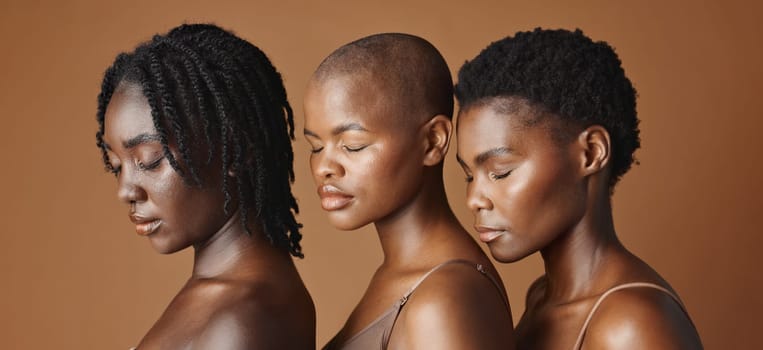 Skincare, beauty and young black women in studio with glowing, natural and facial routine. Wellness, cosmetic and portrait of African female friends with dermatology treatment by brown background