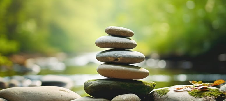 A harmonious stack of smooth river stones in a tranquil natural setting, with a soft focus on a green, sunlit background, evoking a sense of balance and calm.