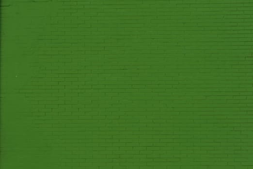 Panoramic solid old green brick wall.