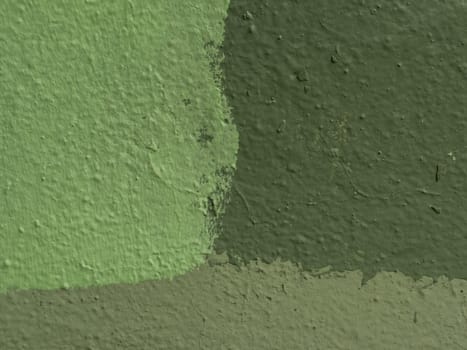 Abstract background of three shades of green. Fragment of a wall with old shabby plaster.