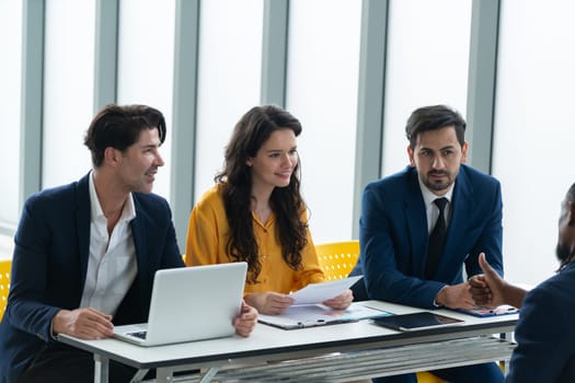 Diversity recruiters interview candidate at the bright office. A group of human resources professionals explaining an applicant for a new position. asking interviewee a question. Intellectual.