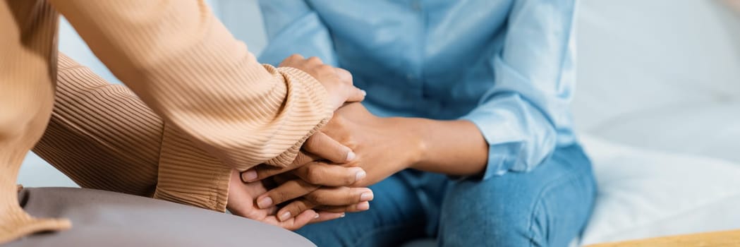 Close up shot of supportive and comforting hands for cheering up depressed patient person or stressed mind with crucial empathy