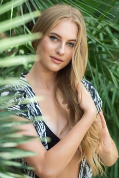 Woman wearing summer clothes on tropical resort