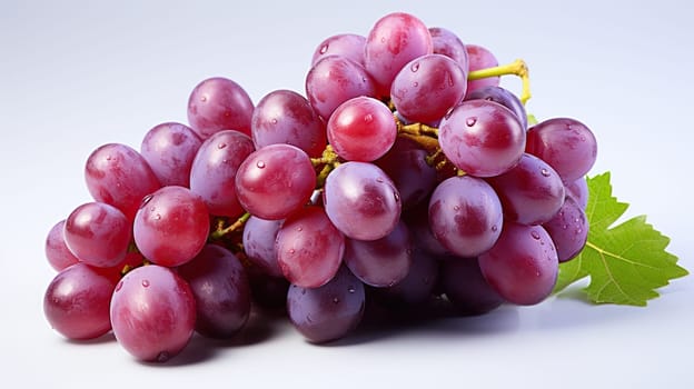 A bunch of ripe red grapes on a white background.