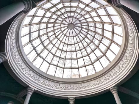 Glass dome with a lattice at the building. The view from the inside. Abstract Background, texture, pattern, copy space, place for text