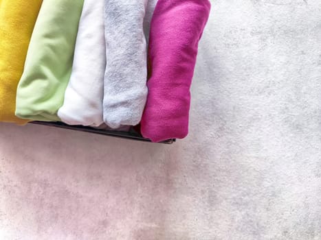 Tidy and organized clothes with the konmari method. Storage of T-shirts folded in box