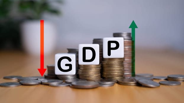 Gross domestic product, Financial, Management, Economic, Inflation, recession and Money concepts, GDP block with Coins stack and UP and Down arrow symbol icon. 