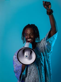 In a powerful and symbolic image, an African American man wears traditional clothing, passionately wields a megaphone against a striking blue background, with his hand raised in the air symbolizing his vocal and cultural empowerment in the pursuit of social justice and equality.