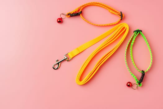 Textile pet collar on pink background studio photo close up