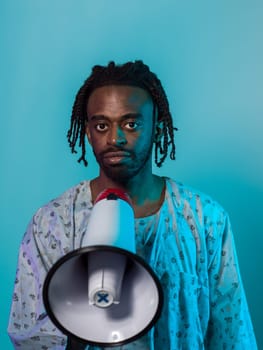 African American man dons traditional attire, passionately utilizing a megaphone against a striking blue background, symbolizing his vocal and cultural empowerment in the pursuit of social justice and equality.