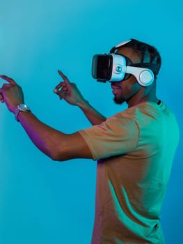 Immersed in a digital realm, an African American man navigates the virtual landscape with a VR goggles, using tactile gestures to interact with virtual objects, showcasing a harmonious blend of technology, innovation, and diverse empowerment.