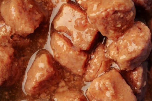 Wet pet food background top view photo close up