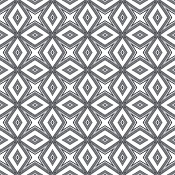 Ikat repeating swimwear design. Black symmetrical kaleidoscope background. Textile ready precious print, swimwear fabric, wallpaper, wrapping. Summer ikat sweamwear pattern.