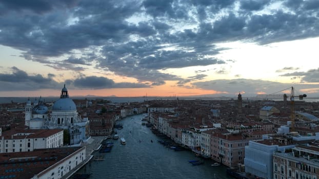 Venice panoramic cityscape landmark at sunset or night, aerial view of Piazza San Marco or st Mark square, Campanile and Ducale or Doge Palace. Italy