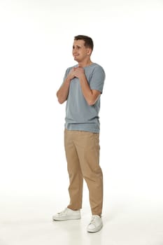 offended frustrated young man on white background. sadness