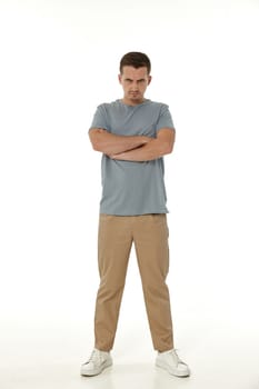 offended frustrated young man on white background. sadness