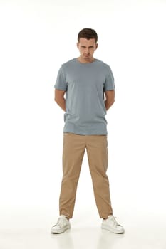 offended frustrated young man on white background. sadness