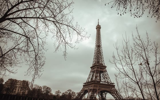 France, Paris - Jan 4, 2024 - Nice scenery of Eiffel Tower in Paris at Afternoon. Destinations in Europe. Space for text, Selective focus.