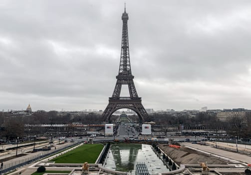 France, Paris - Jan 4, 2024 - Nice scenery of Eiffel Tower with sky background in Paris. View from Trocadero view point at evening, Destinations in Europe. Space for text, Selective focus.