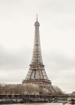 France, Paris - Jan 4, 2024 - Nice scenery of Eiffel Tower and Seine River in Paris at Afternoon. Destinations in Europe. Space for text, Selective focus.