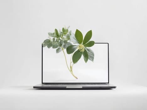 Immerse yourself in nature with a laptop displaying a vibrant plant, creating a refreshing work environment.