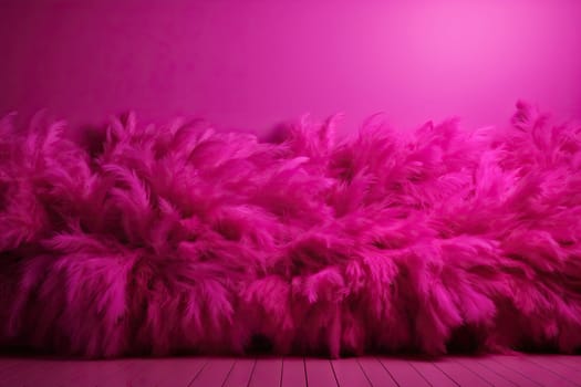 Burgundy pink background with fluffy feathers and space for text. Fashionable tone.
