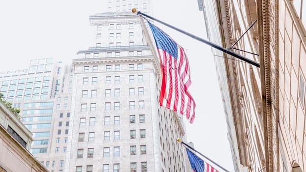 American flags on the main facade of the New York Stock Exchange - NYSE Building in the Financial District of Lower Manhattan in New York City is seen on July 4th, 2023.