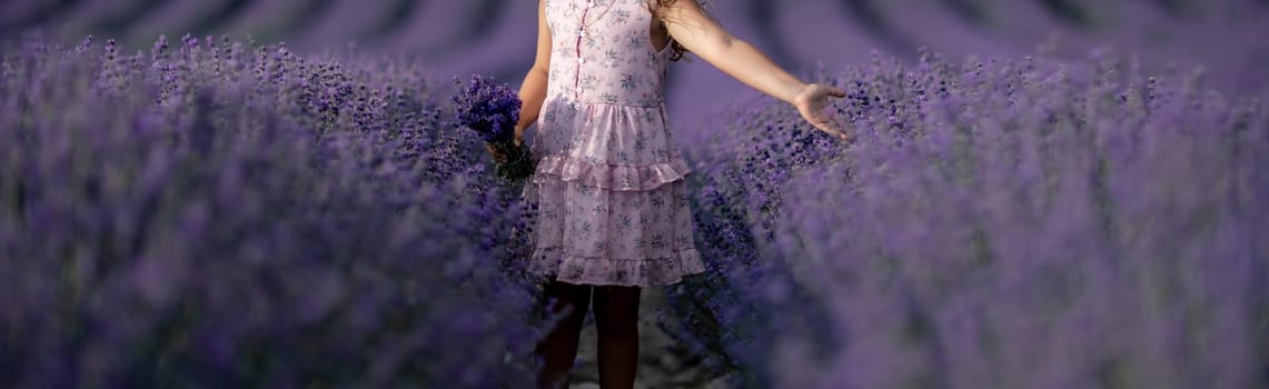 Lavender field girl. happy girl in pink dress in a lilac field of lavender. Aromatherapy concept, lavender oil, photo session in lavender.