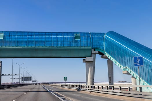 pedestrian crossing next to overpass.Convenience and safety for pedestrians.