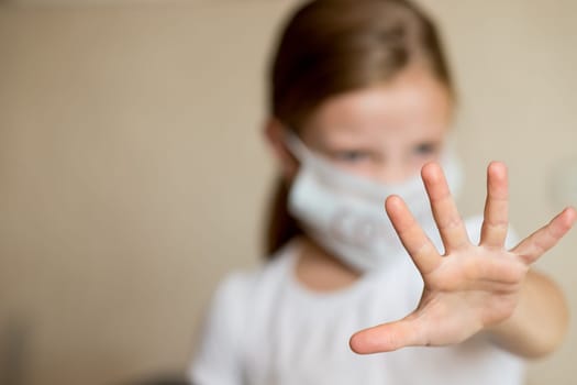 Virus mask woman wearing face protection in prevention for coronavirus showing gesture Stop Infection