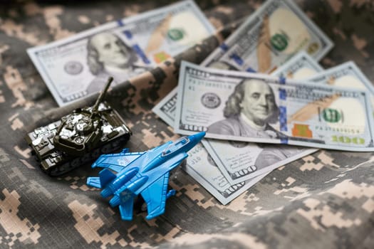 tank against the background of dollars. Concept of war. High quality photo