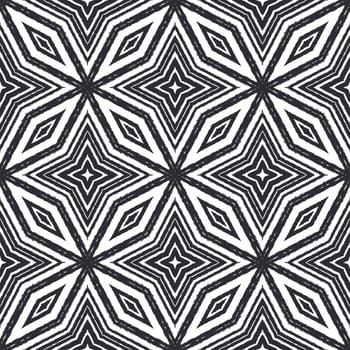 Ikat repeating swimwear design. Black symmetrical kaleidoscope background. Textile ready attractive print, swimwear fabric, wallpaper, wrapping. Summer ikat sweamwear pattern.