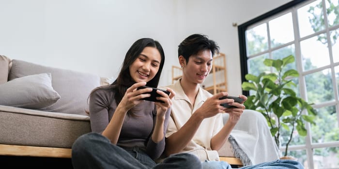 couple man and woman talking working spend time together at home, Asian couple lifestyle concept.