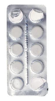 Round white tablets in blister pack, top view