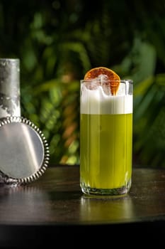 Luxury cocktail on the wooden table on a dark background