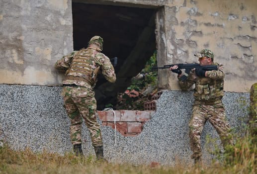 In a high stakes mission, a specialized military unit executes a tactical operation to secure a dangerous house where terrorists are believed to be hiding, showcasing precision and coordinated maneuvers.
