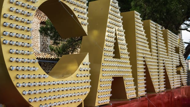 Sign Cannes written with light bulbs. Cannes French Riviera on Cote d'Azur in France