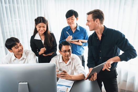 Group of diverse office worker employee working together on strategic business marketing planning in corporate office room. Positive teamwork in business workplace concept. Prudent