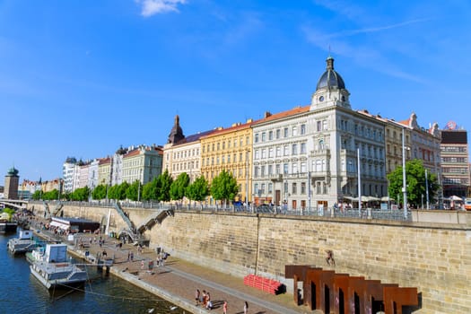 22 May 2022 Prague, Czech Republic. Ships of various sizes and types navigate the Vltava River, contributing to the vibrant atmosphere of the city.