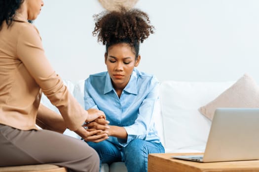 Close up shot of supportive and comforting hands for cheering up depressed patient person or stressed mind with crucial empathy