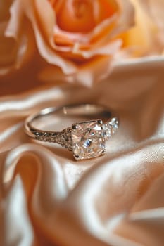 Stunning cushion cut diamond engagement ring. Selective focus. white.